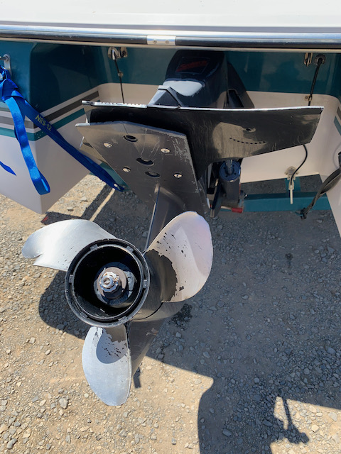 trashed speedboat propeller
